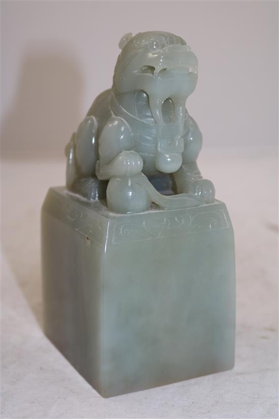 A large Chinese celadon jade lion-dog seal, height 15.5cm